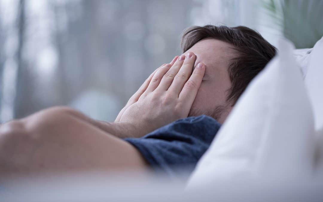 male sleeping with Jaw Alignment and Sleep Apnea problems